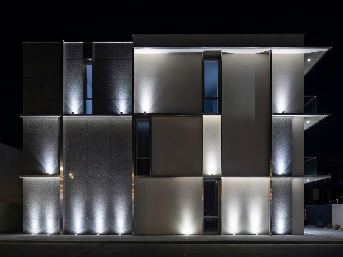Building facade highlighted by precision architectural lighting at night
